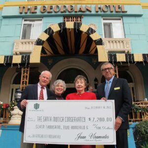 (L-R) Georgian Hotel owner, Ted Broedlow; Carol Lemlein, Santa Monica Conservancy president; Kay Pattison, leader of the Santa Monica Conservancy's Downtown Walking Tours; Georgian Hotel General Manager Juan Viramontes.                        