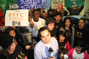 Pico Youth & Family Center founder Oscar de la Torre speaks to newscrews earlier this year before asking  the City Council to continue funding for the embattled center. (File photo)