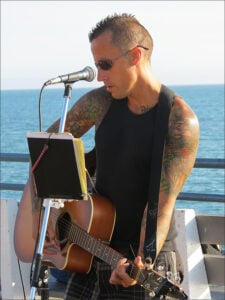 PIER PRESSURE: Casey O'Day went from owning a market to performing on the pier. (Photo courtesy Casey O'Day)       