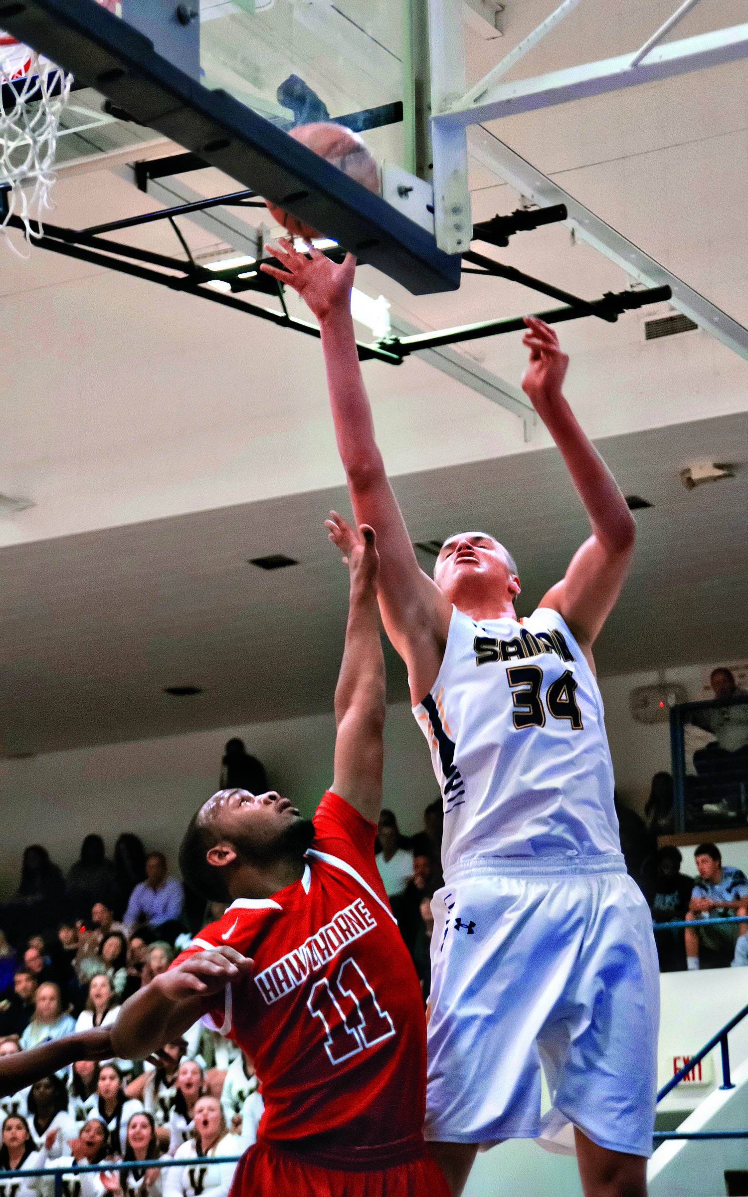 Jayce Johnson (right) is thriving at Santa Monica, his fourth high school in three years. (photo by Morgan Genser)