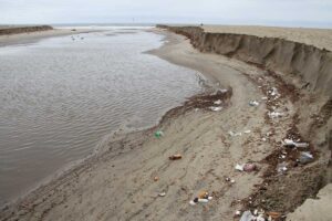 While Santa Monica and the rest of California desperately needs rain, one negative side effect of Friday's showers is urban runoff that flows from the storm drain at the end of Pico Boulevard brings with it garbage from inland communities. (Kevin Herrera kevinh@www.smdp.com)