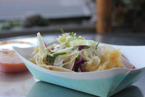 Perfectly crispy, lightly breaded in a tempura-like batter and wrapped with cabbage and thinly sliced radishes, the fish taco at Tacos Punta Cabras stands up with the best around. (Michael Ryan michael@www.smdp.com)