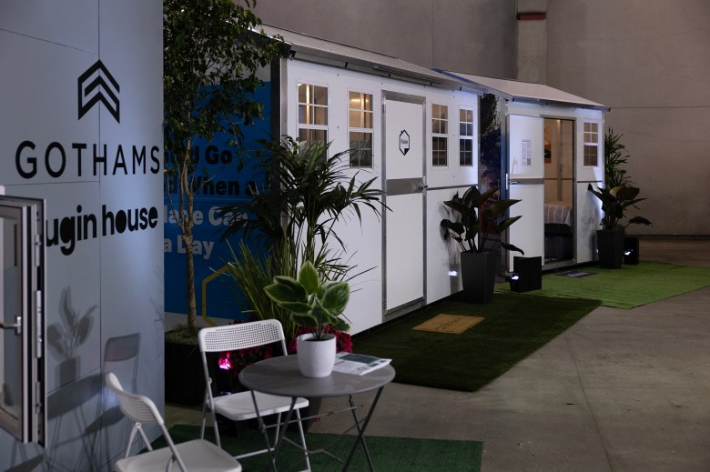 A row of a tiny homes on display at Cal Expo. Gov. Gavin Newsom announced the state's plan to address homelessness across the state at Cal Expo in Sacramento, on March 16, 2023. Photo by Miguel Gutierrez Jr., CalMatters