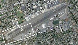 BIG CHUNK: The west end of Santa Monica Airport marked off by white lines could be closed by city officials in 2015. (Image courtesy Google Earth)