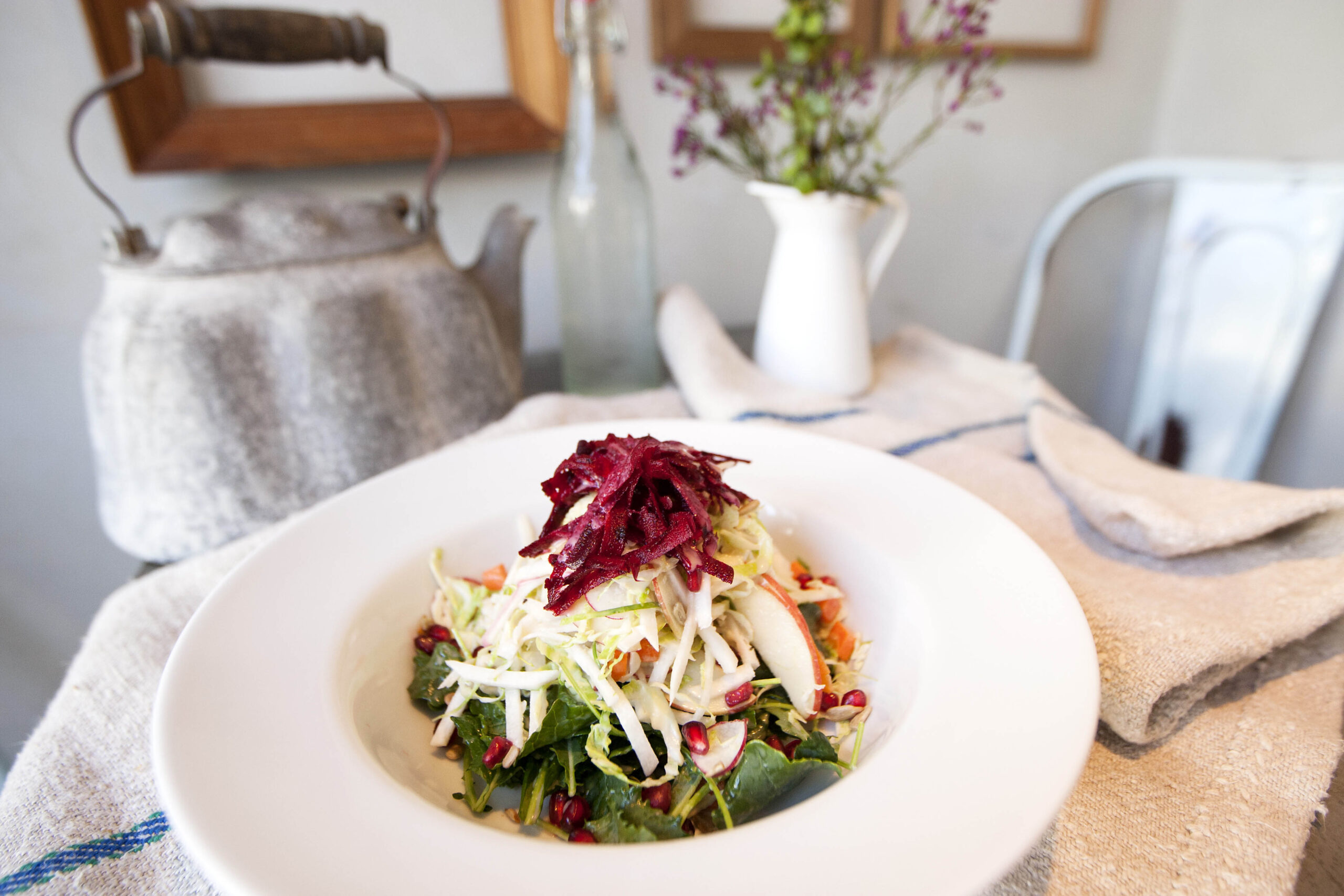 The Chop Chop salad, which includes kale, turnips, radish and pomegranate seeds, on display at The Courtyard Kitchen. (Michael Yanow editor@www.smdp.com)