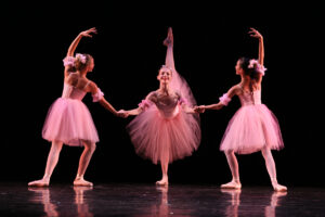 ON STAGE: Sarah Drake (center) in an earlier spring performance of Westside Ballet's dances featuring Faust. (Photo courtesy Todd Lechtick)