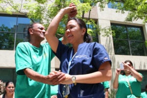 Health workers at Santa Monica-UCLA Medical Center took a little time to dance during a strike at the hospital on Tuesday. The workers were protesting what they call unsafe staffing levels at all University of California-operated health facilities. (Photo by Daniel Archuleta)