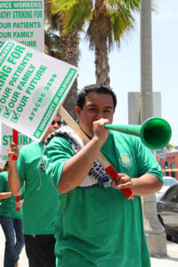 Health workers strike outside of Santa Monica-UCLA Medical Center on Tuesday. (Photo by Daniel Archuleta)