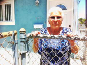 NO! Miriam Ginzburg in front of her Ocean Park Boulevard home. The longtime Santa Monica resident is waging a battle against development. (Photo courtesy Matthew Hynes)