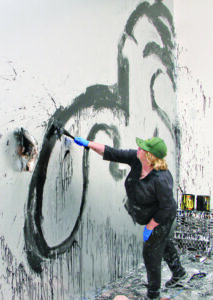 Artist Joyce Pensato works on a site-specific piece for her show I Killed Kenny at the Santa Monica Museum of Art. (File photo)