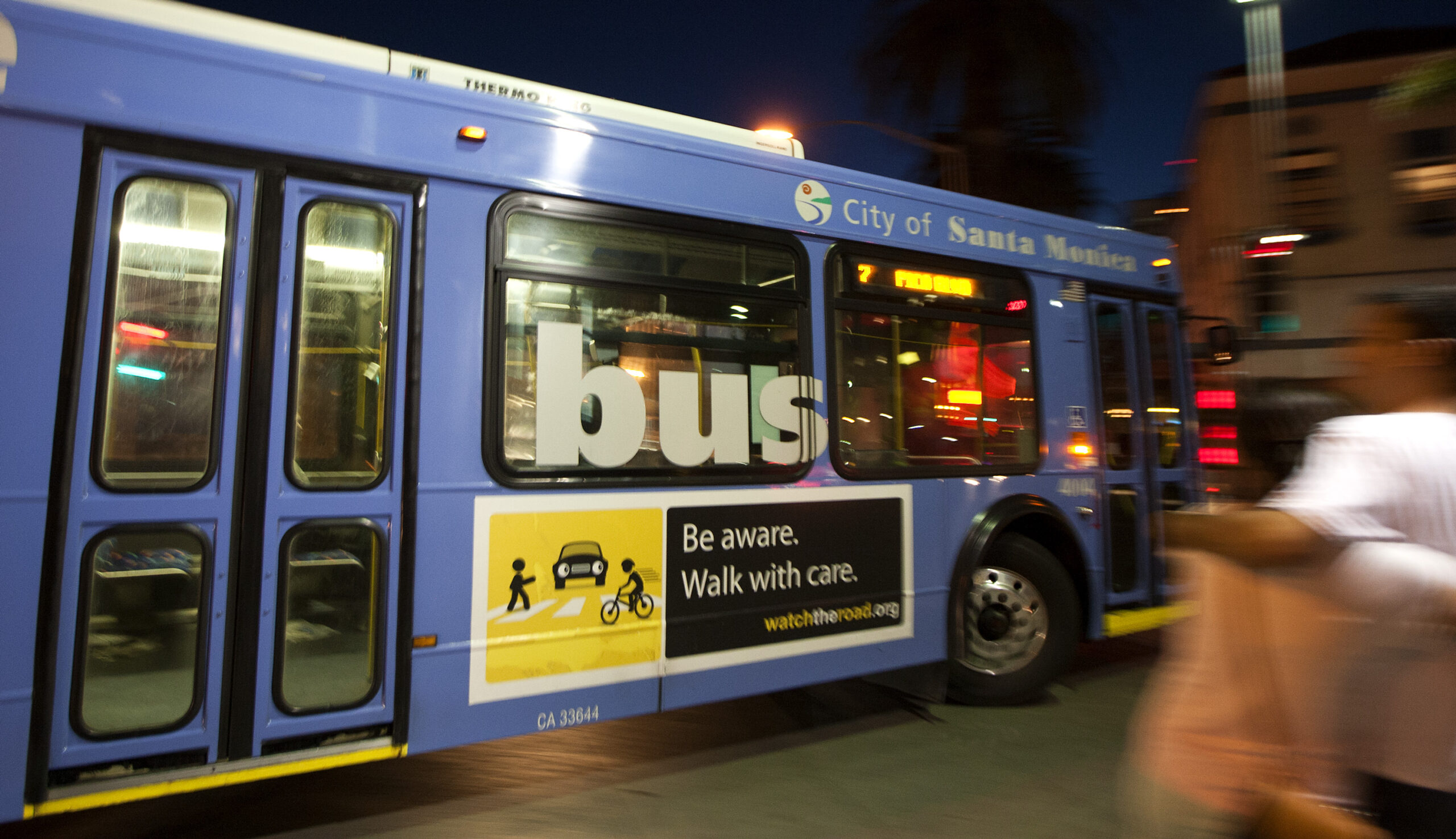 A Big Blue Bus makes a right turn onto Santa Monica Boulevard last month. The director of the bus company said big changes are needed.    (Photo by Michael Yanow)