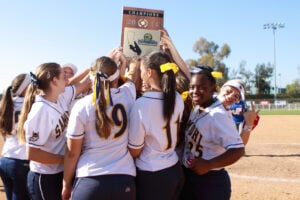 PROPS: Santa Monica High School's softball team celebrates in Irvine on Saturday after winning the CIF-Southern Section Division IX title. (Wendy Perl editor@www.smdp.com)