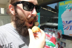 The bearded man enjoying his empanadas. (Michael Ryan michael@www.smdp.com)