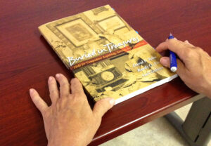 The book 'Buried in Treasures' was part of a discussion on senior hoarding at the Ken Edwards Center on Wednesday. (Ameera Butt ameera@www.smdp.com)