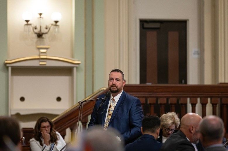 Assemblymember Devon Mathis, a Porterville Republican, shares his story regarding suicide, after Assemblymember Gail Pellerin discussed the loss of her husband to suicide with a reading on Assembly Concurrent Resolution 106. Mathis served in the military, losing more colleagues to suicide after serving. Photo by Rahul Lal for CalMatters