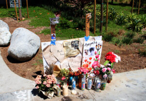 IN THEIR THOUGHTS: A memorial for Margarita Gomez sits outside of the Santa Monica College library on Wednesday. Gomez was shot and killed by John Zawahri during a shooting rampage in June. (Daniel Archuleta daniela@www.smdp.com)