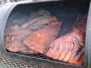 PATIENCE, MY FRIEND: Smoking meat takes time, but it enhances flavor and tenderness. (Photo courtesy John Blanchette)