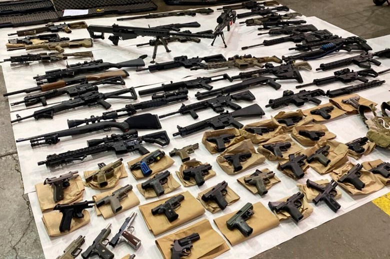 Assault weapons, multiple high-capacity magazines, pistols, and other weapons seized from the home of homicide suspect Vu Thai who was arrested June 5, 2022, in connection with a fatal shooting in San Jose. Photo courtesy of the San Jose Police Department via AP