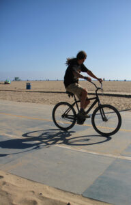 A man rides his bike along the beach bike path on Tuesday. (Daniel Archuleta daniela@www.smdp.com)