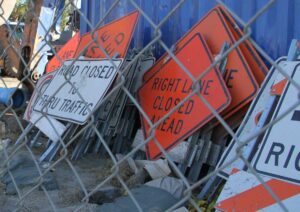 Signs sit at one of the construction sites for the Expo Light Rail Line. (Daniel Archuleta daniela@www.smdp.com)