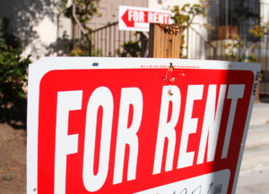 For rent signs sit in front of an apartment building on Fifth Street.