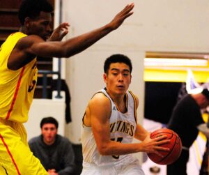 Samohi's Travis Fujita makes a move against Fairfax on Saturday at home. (Morgan Genser editor@www.smdp.com)