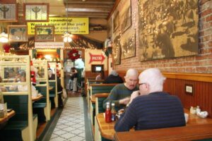 The Omelette Parlor features classic photos from Santa Monica's past. The Main Street restaurant, a staple for 37 years, is now, too, history.  (David Mark Simpson dave@www.smdp.com)