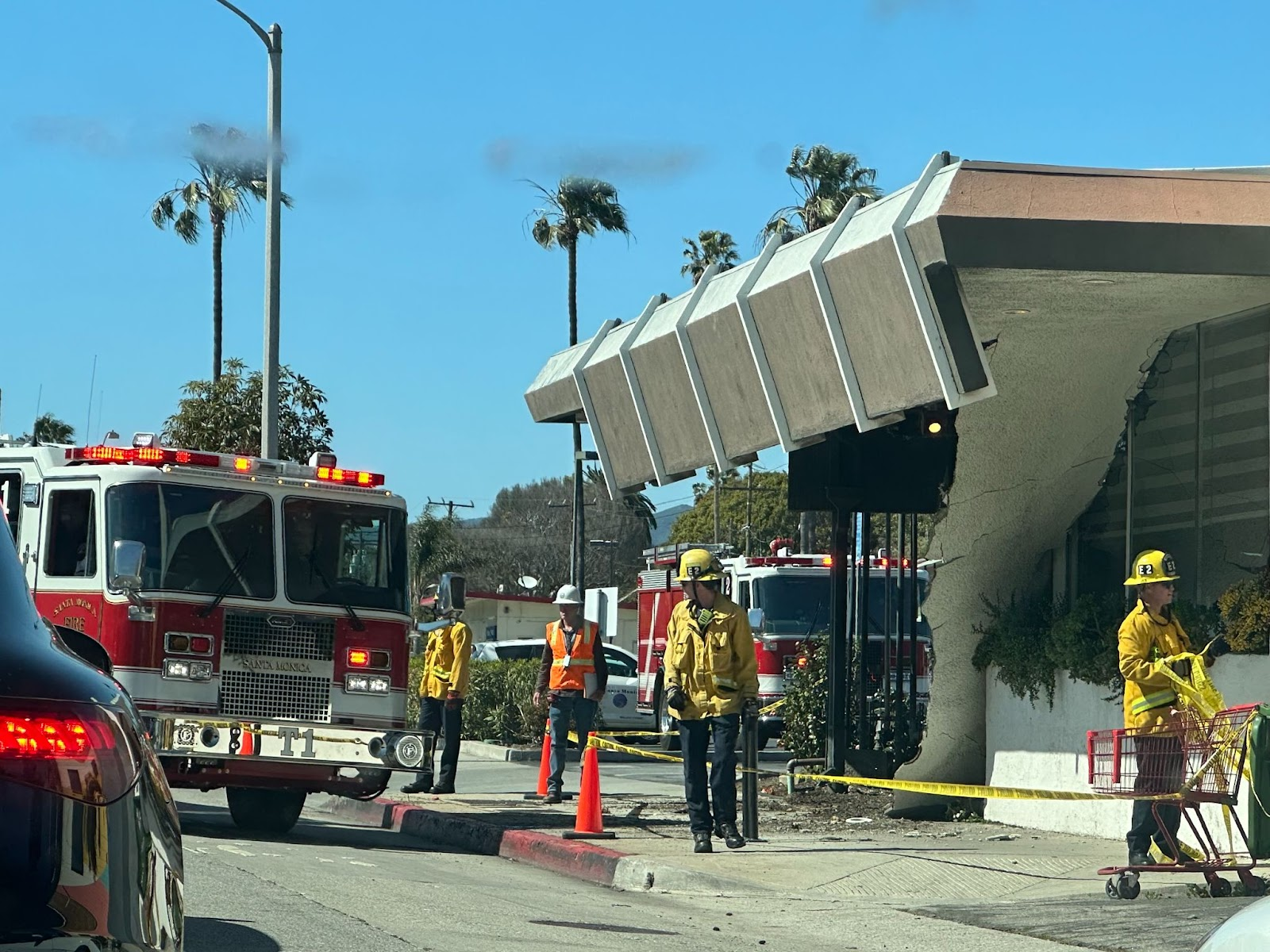 Fire fighters respond to the collapsed ceiling outside of Nonstop Sushi and Sake Bar on Lincoln Boulevard