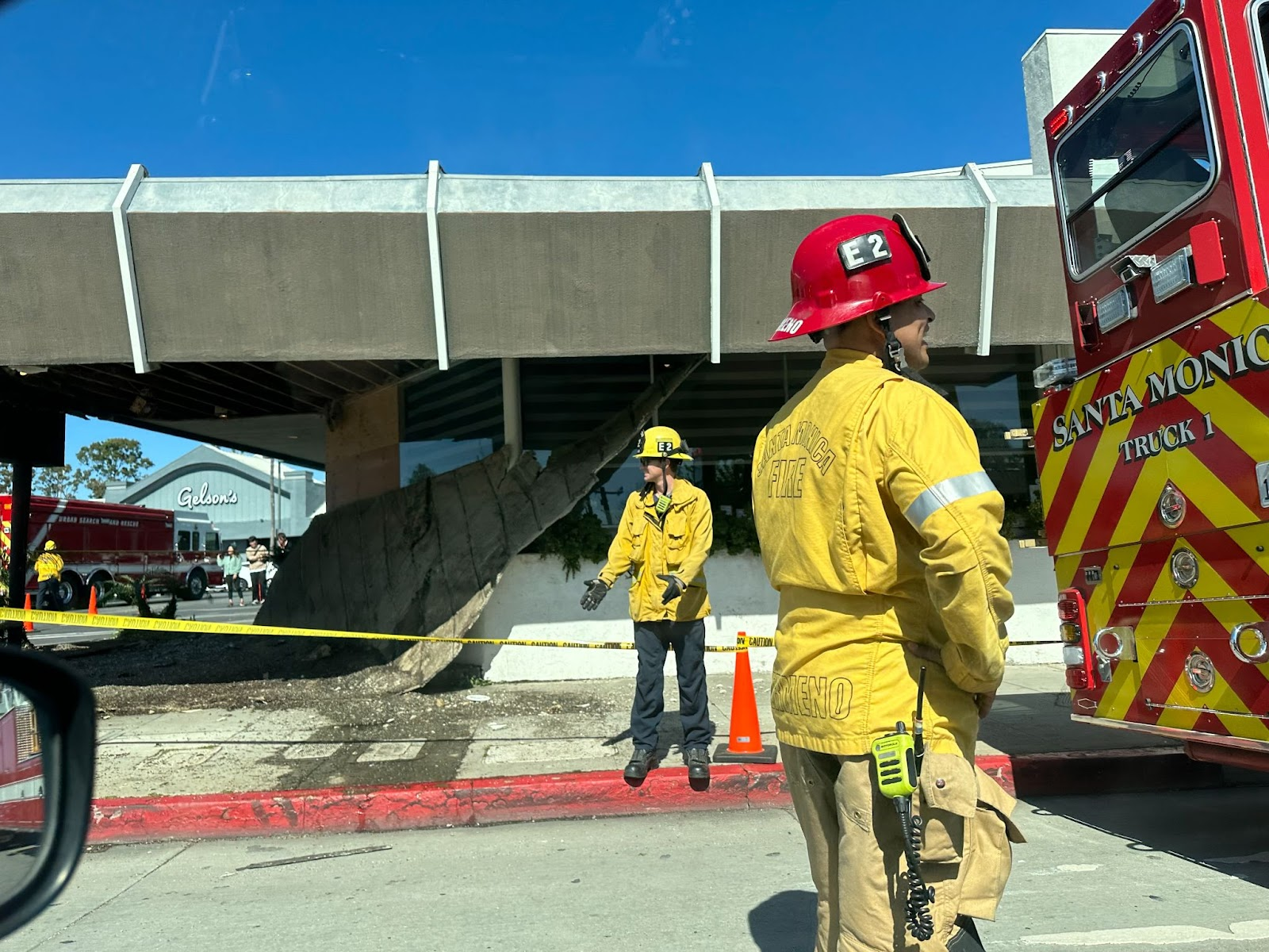 Fire fighters respond to the collapsed ceiling outside of Nonstop Sushi and Sake Bar on Lincoln Boulevard