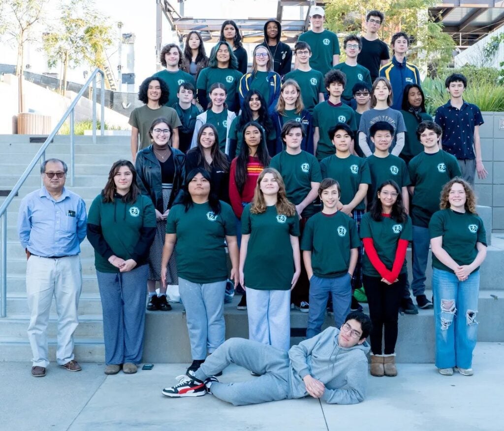 a group of people posing for a photo