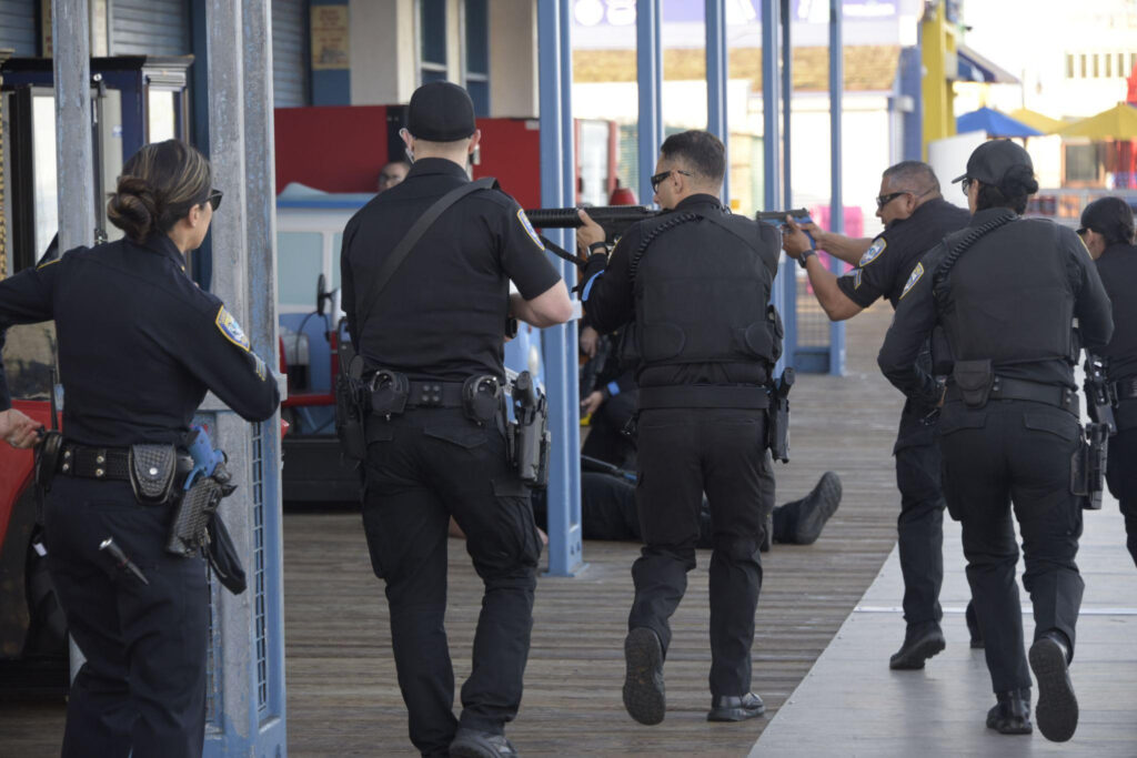 SMPD officers approach the Pier arcade