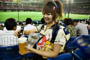 A woman pours beer at a baseball game in Japan. (Photo courtesy accidentalepicurean.com)