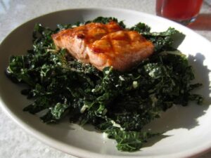 True Food Kitchen's Tuscan kale with salmon may look healthy, but it could use more flavor. (Photo courtesy Google Images.)