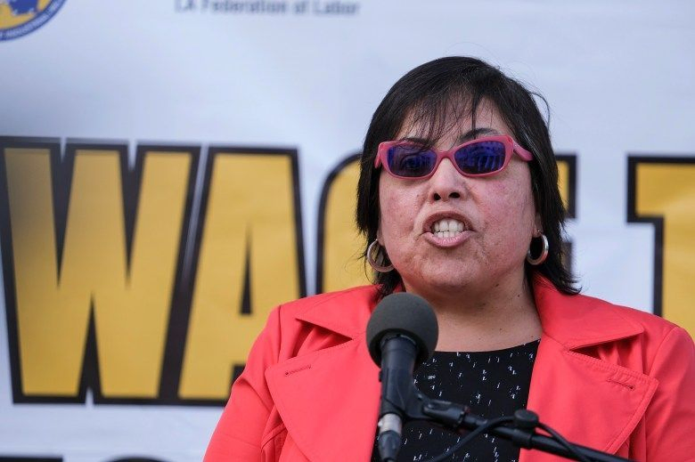 Labor Commissioner Lilia Garcia-Brower speaks on the front steps of the Hall of Justice in Los Angeles, during a press conference on Feb. 9, 2021. Photo by Ringo Chiu, AP Photo